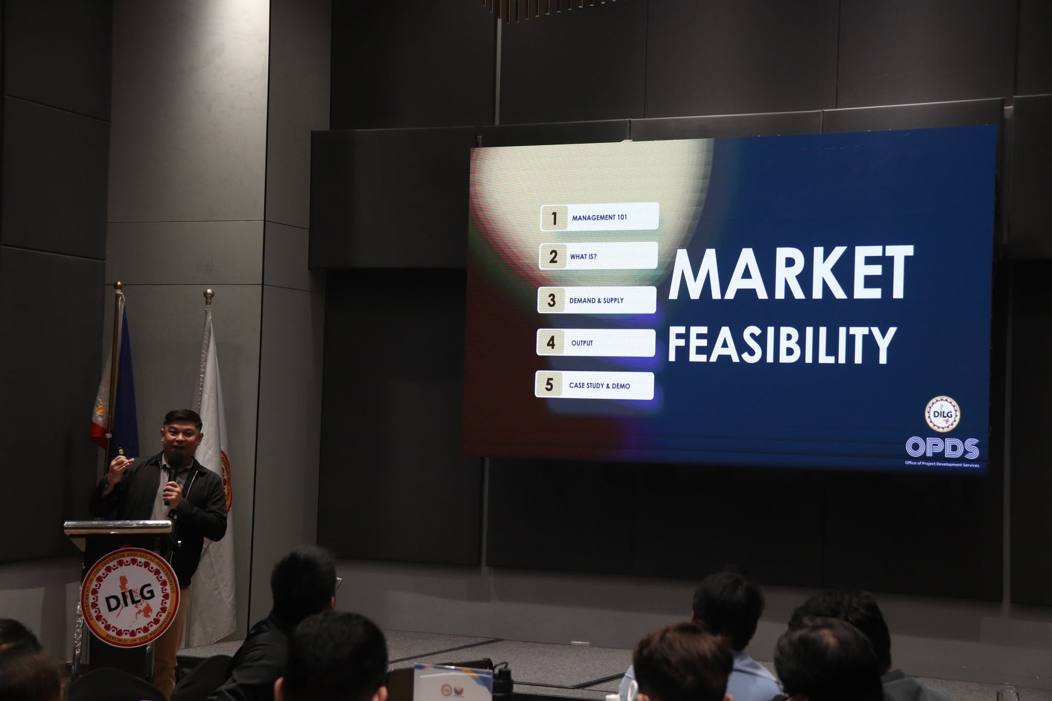 Training 12 RM Nisperos facilitating a Feasibility Analysis training for DILG-OPDS